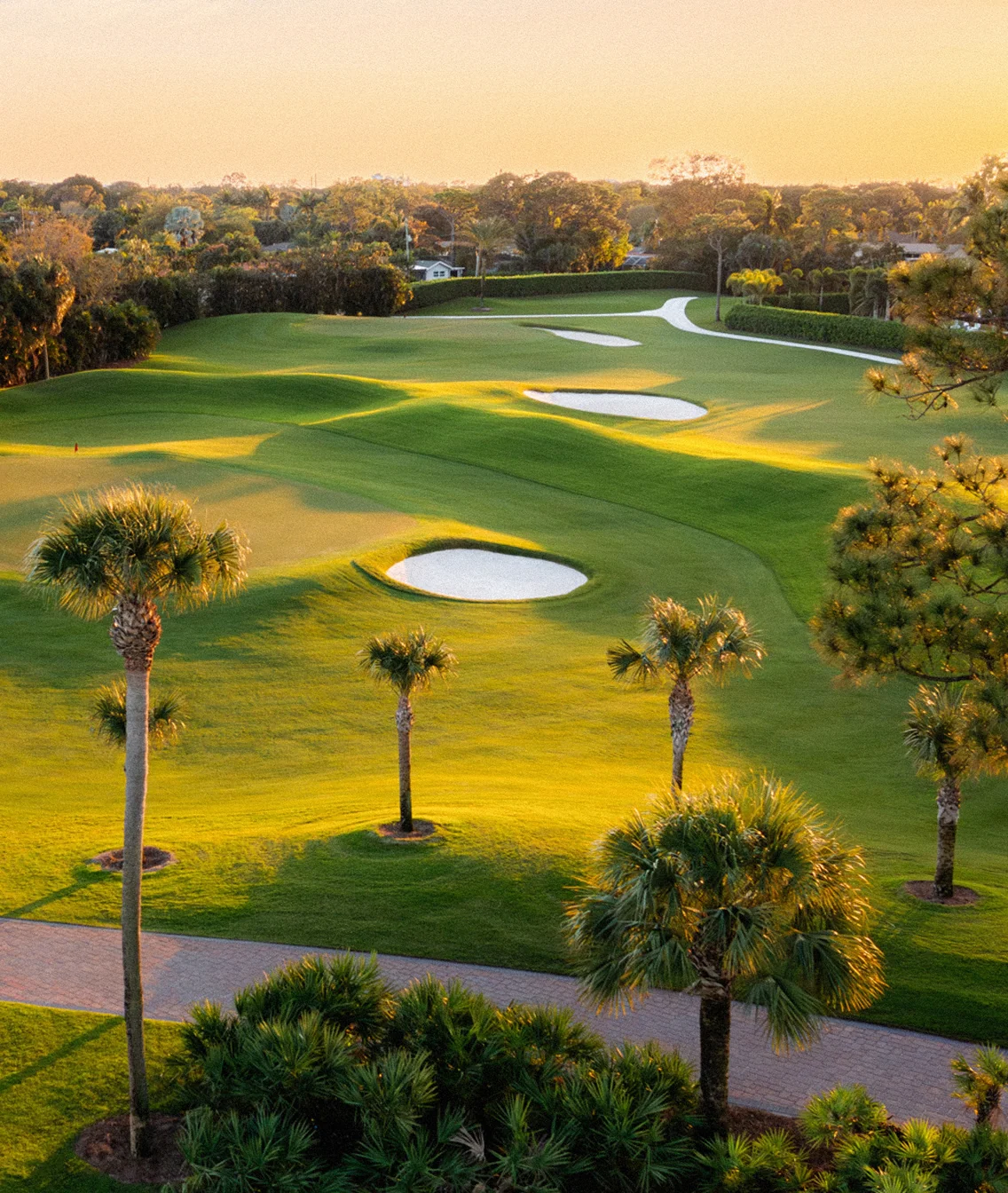Wide fairway view at golden hour at The Seagate Hotel Golf Club in Delray Beach