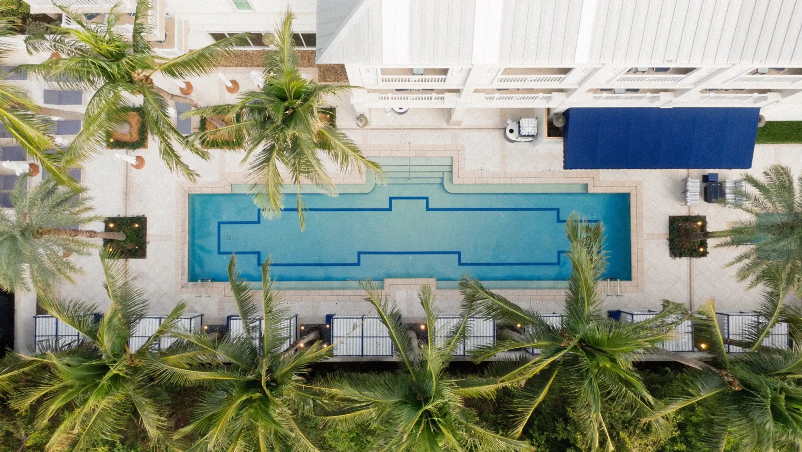 Aerial view of the rectangular pool and surrounding terrace at The Seagate Hotel in Delray Beach, Florida