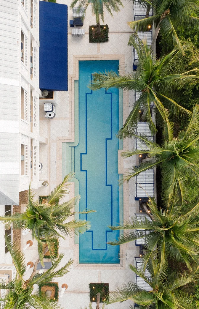 Aerial view of the rectangular pool and surrounding terrace at The Seagate Hotel in Delray Beach, Florida