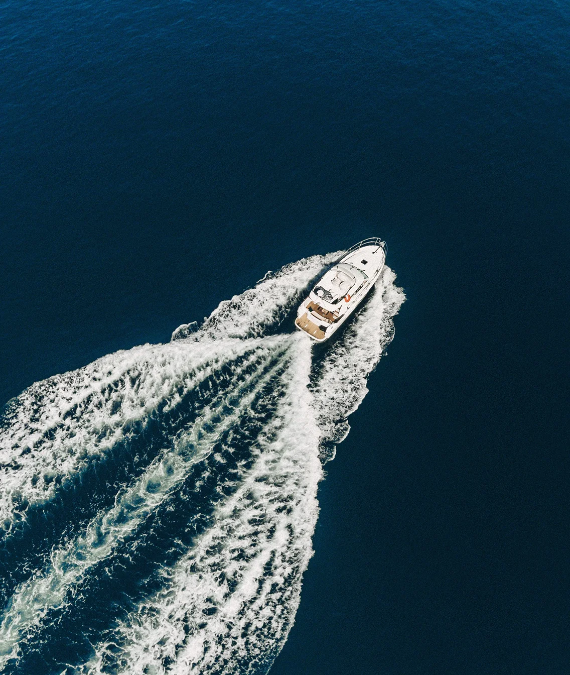 Aerial shot of a YachtHampton yacht underway at sea, available as a member benefit